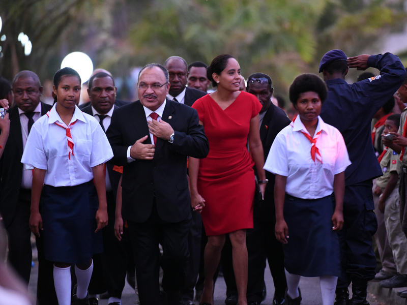 Prime Minister Peter O'Neill (centre) arrives at a ceremony to mark 40 years of independence in Port Moresby, Papua New Guinea, Wednesday, Sept. 16, 2015. It was on this day in 1975 that Papua New Guinea gained independence from Australia. (AAP Image/Mick Tsikas) NO ARCHIVING